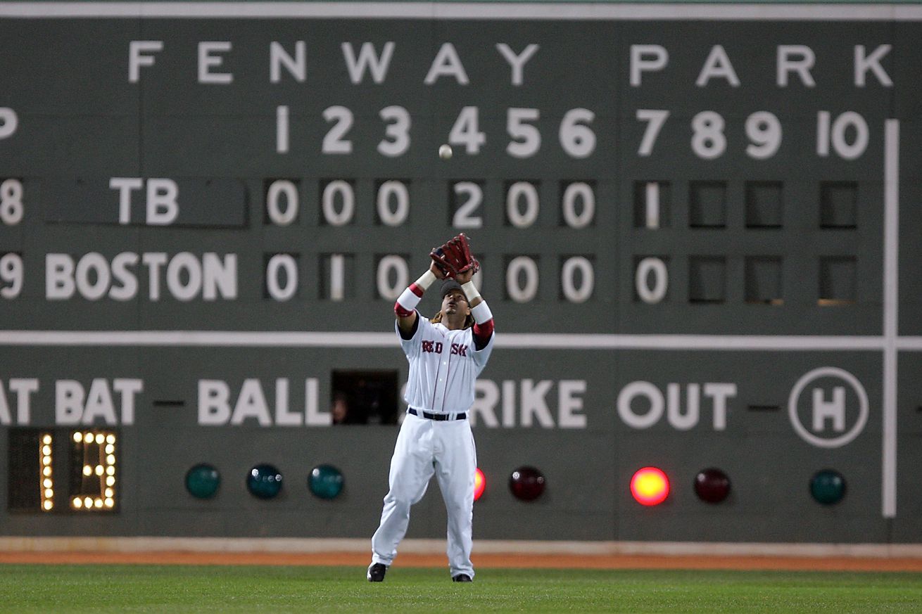 (4/20/06-Boston, MA) Boston Red Sox Vs Tampa Bay Rays at Fenway Park. Manny Ramirez catches Carl Crawford’s pop out in the 8th inning. (Staff Photo By Matt Stone-Friday)