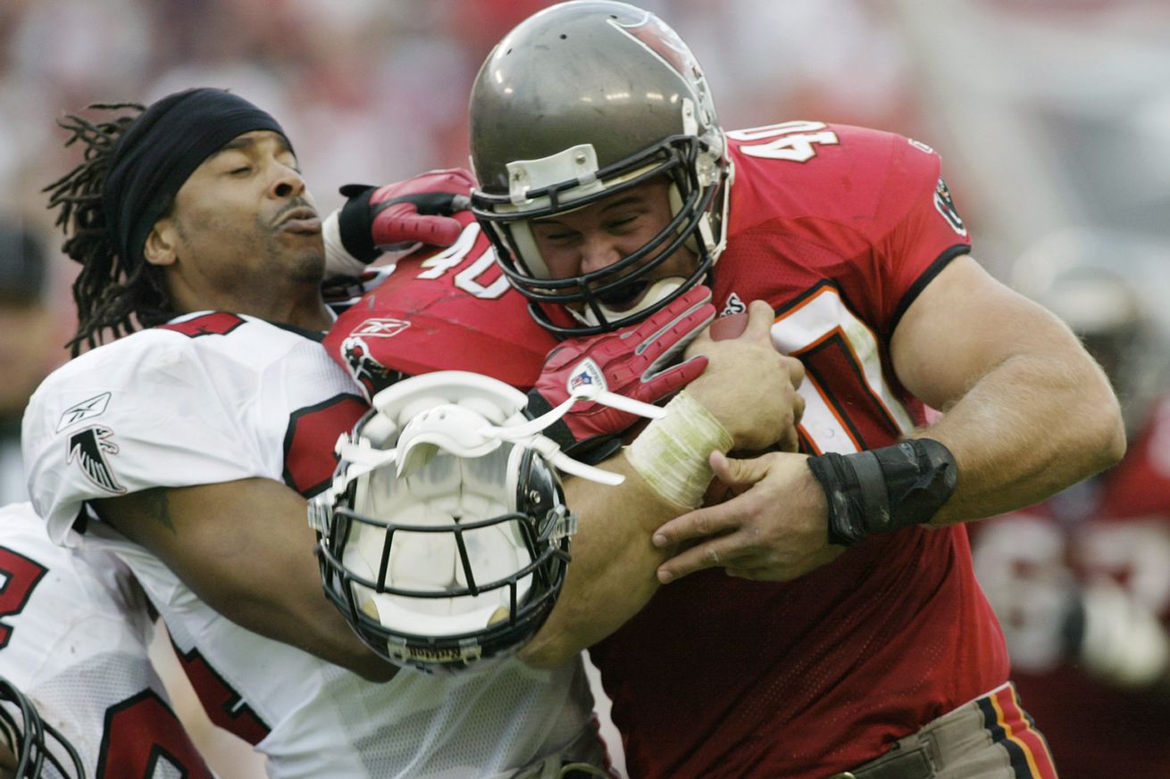 Alstott runs with ball